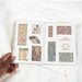 Open book displaying traditional illustrations and patterns on a white background