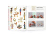 Open book showing illustrations of wooden toys and step-by-step instructions.