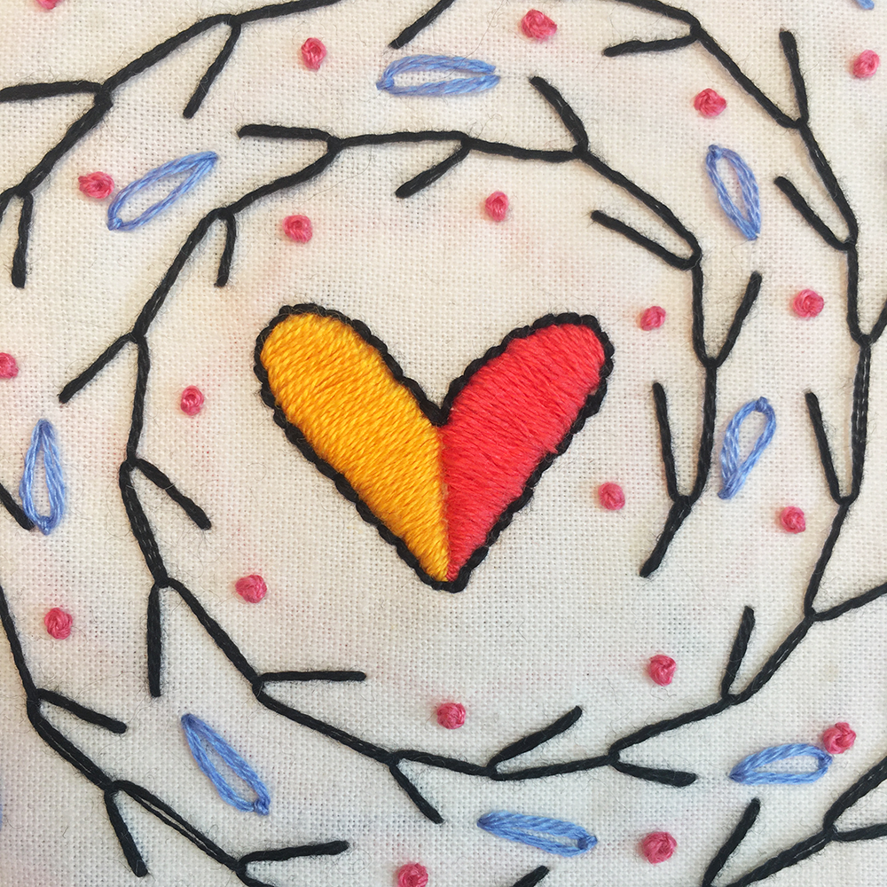Hand Sampler Embroidery Kit- detail of stitching heart center