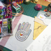 Hand Sampler Embroidery Kit- work in progrss on table with additoonal materials shonw
