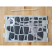 Paper geometric pattern with layered figure in background- flattened with a wooden stick on a wooden surface