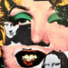A close-up collage-style artwork featuring a large pink-toned face with black-and-white cutout portraits of a woman's face and open lips showing teeth, overlaid with bright green eye shapes and yellow hair-like marks.
