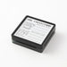Midori Stamp Pad- Ink Collection stamp shown out of packaging on white background