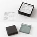 Midori Stamp Pad- Ink Collection stamp shown open, with lid and stamp, and a sample stamp shown
