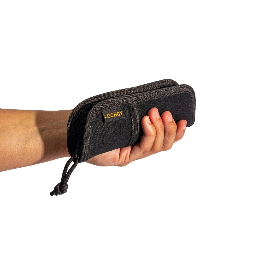 Lochby Duo Pen Pouch in black shown held in a hand