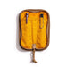 Lochby Duo Pen Pouch in olive color shown lying open with yellow interior and two sample pens (not included) show in pouches