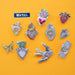 Aluminum Tooling Foil used in various projects on orange background.