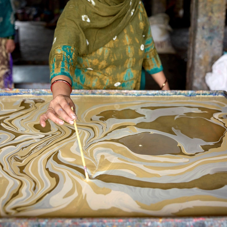 Handmade Indian Cotton Paper- Marbled Champagne -Free Spirit- shades of yellow and gold- marbling in process