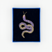 Beaded snake brooch in a blue box with black velvet lining on a white background