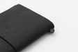 This decorative metal clasp keeps the elastic band in place to hold your notebooks. 