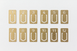 TRAVELER'S COMPANY Brass Number Clips comes with 12 clips. 