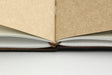 Use the Binding Bands to add additional notebooks and accessories to your Passport TRAVELER'S notebook.  