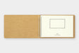 The notebook measures approximately 7.5 by 5 inches (H130 x W193 x D18mm) so it will easily fit in a bag. 